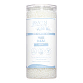 Container of satin smooth Pure Clear pebble wax with a white background
