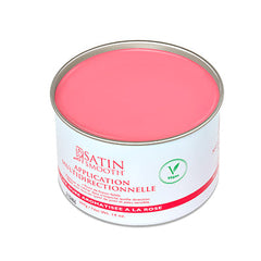 Angled top view of a 14 ounce can of Satin Smooth Multidirectional Application Rose Aroma Hard Wax featuring its glossy pink color