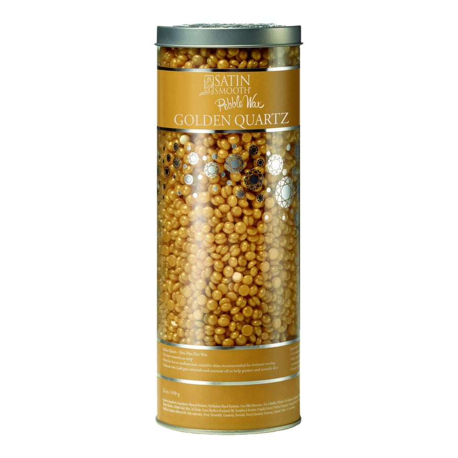 Tall cylindrical container filled with golden quartz beads on a white background
