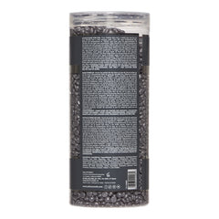 Tall cylindrical container with black beads and text on a white background