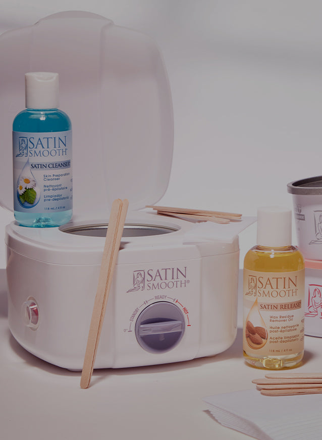 Clean & Easy wax warmer, pre and post products, and wax cans displayed on a white background. 