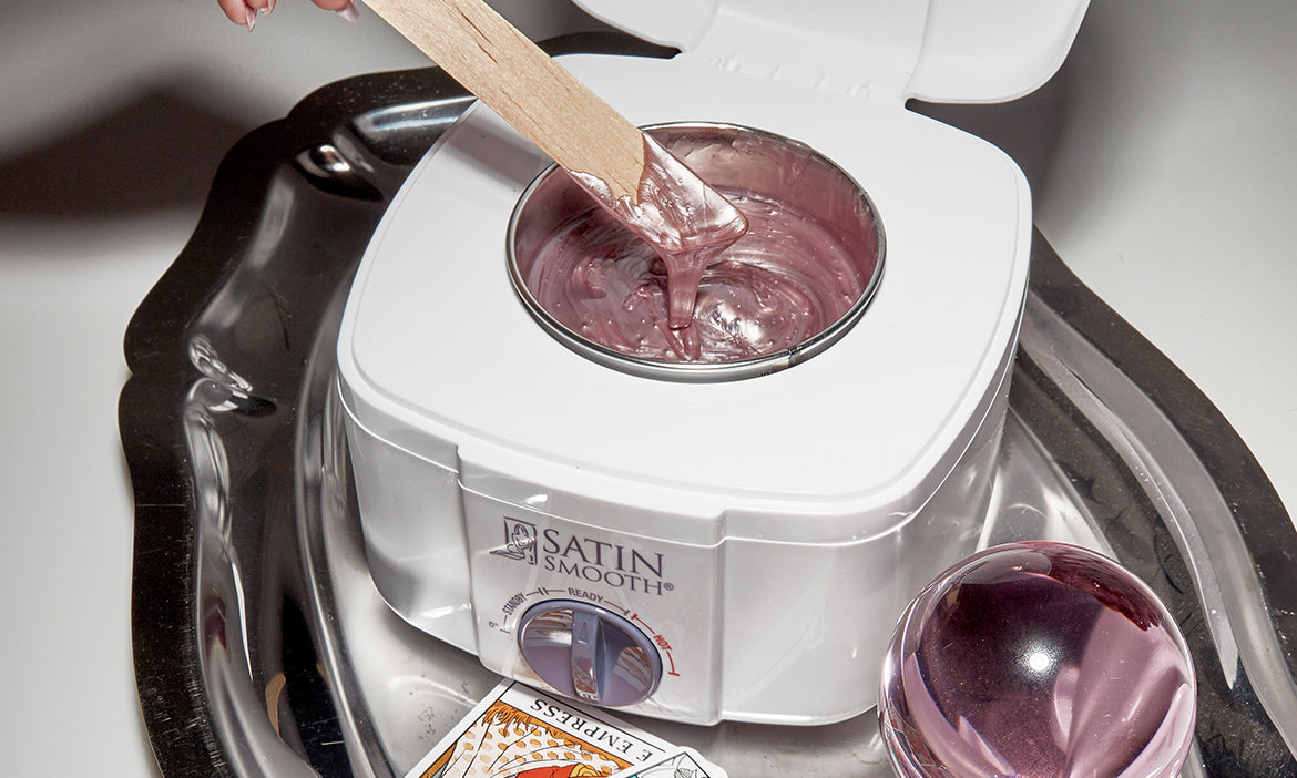 warm wax on a Satin Smooth warmer over a silver plate