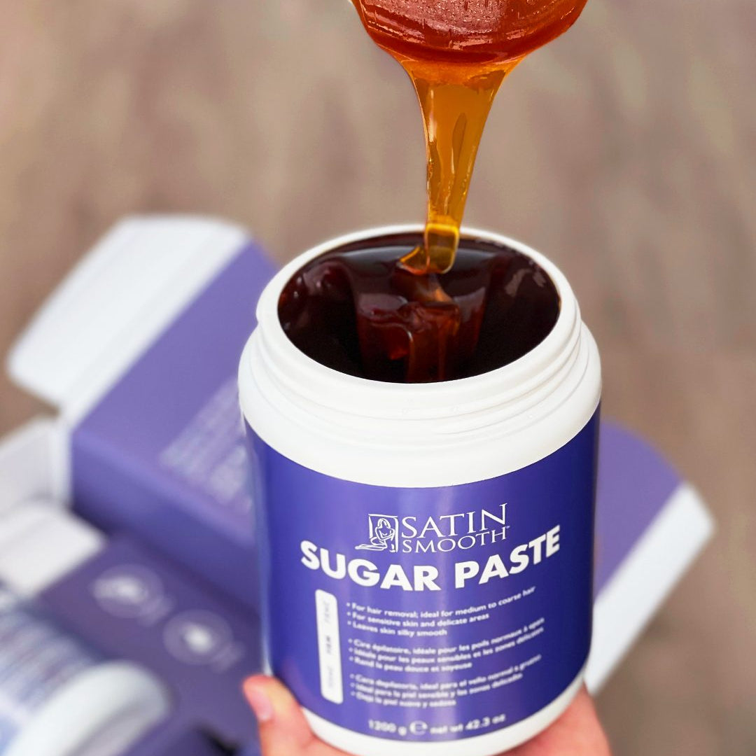 Satin Smooth sugar paste being opened from its container 