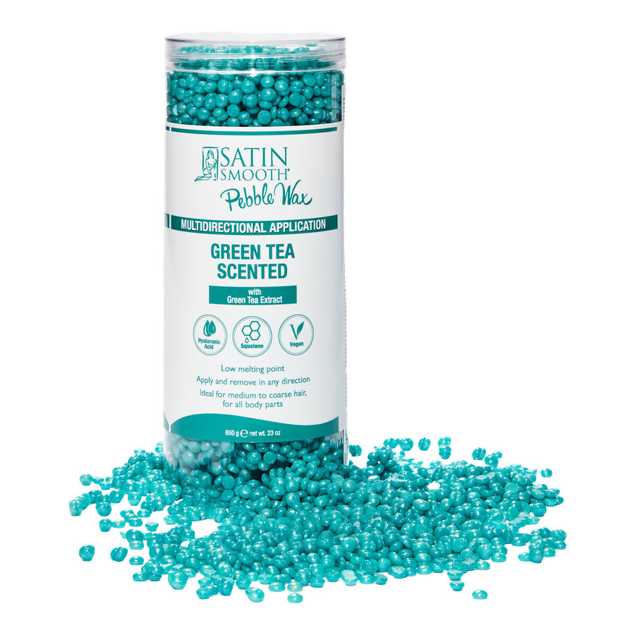 Container of green tea scented wax beads with a white background