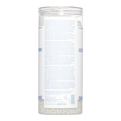 Back of satin smooth Pure Clear pebble wax with a white background