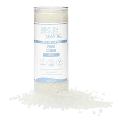 satin smooth Pure Clear pebble wax with a white background