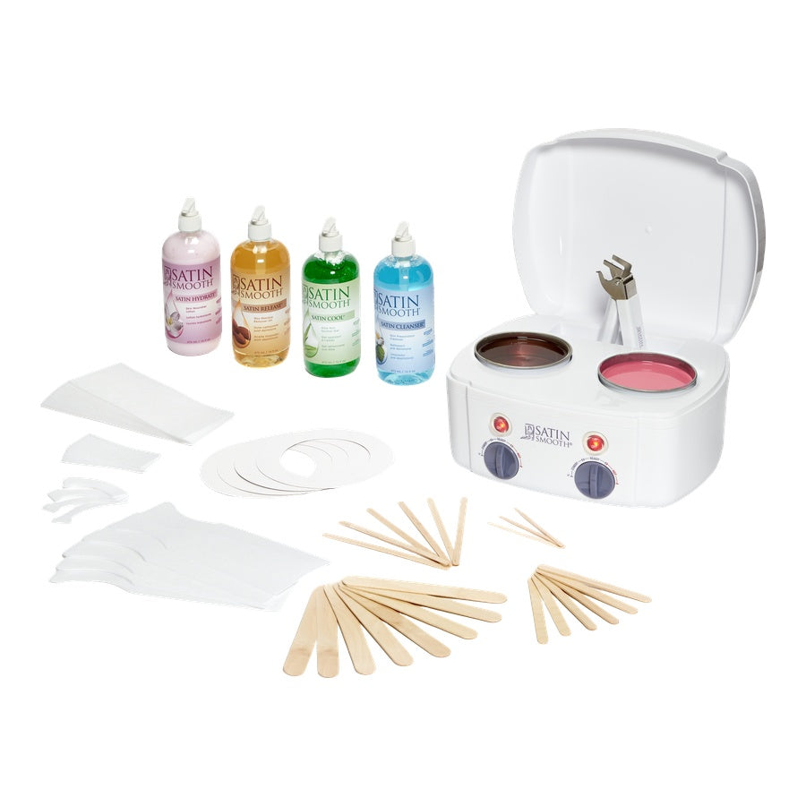 Hair removal kit with bottles, a hair removal device, and accessories on a white background