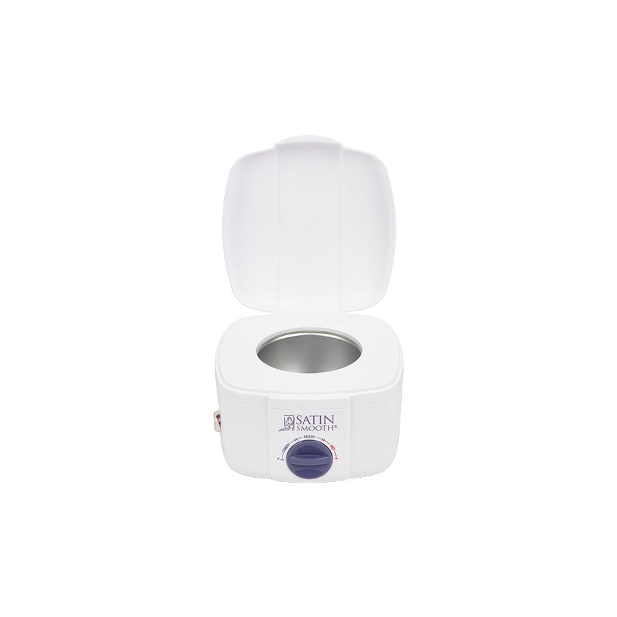 open wax warmer on a white background