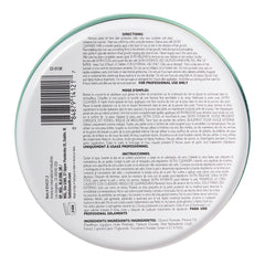 Back label of a cosmetic product with text and a barcode on a white background