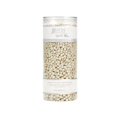 A 23-ounce canister of Satin Smooth PEBBLES WAX™ Ultra Sensitive Zinc Oxide Thin-Film Flex Wax standing 