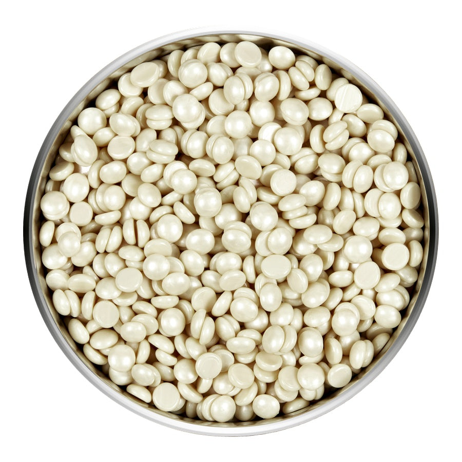 Satin Smooth Pebble Wax in a metal bowl on a white background
