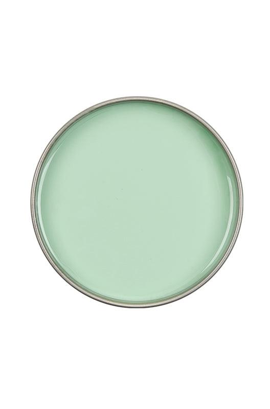 Top view of an open can of Satin Smooth Aloe Vera Wax featuring its creamy light green color