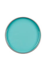 Top view of an open can of Satin Smooth Tea Tree Wax showing its creamy light green color