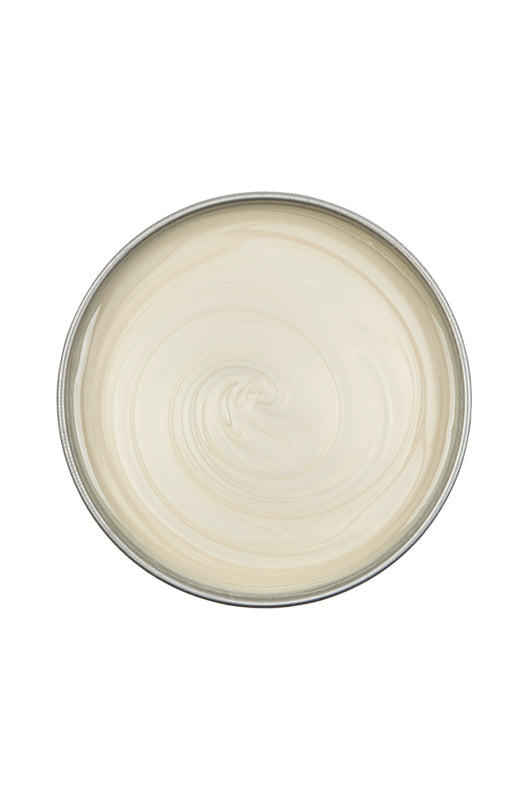 Top view of an open can of Satin Smooth Zinc Oxide Wax showing its creamy beige color