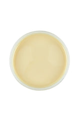 Top view of an open container of Satin Smooth beBare Hair Removal System Soy Wax featuring its creamy beige color