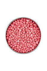 Top view of Wild Cherry wax beans  for hair removal inside a canister isolated in white background